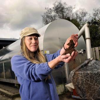 Woman and composter